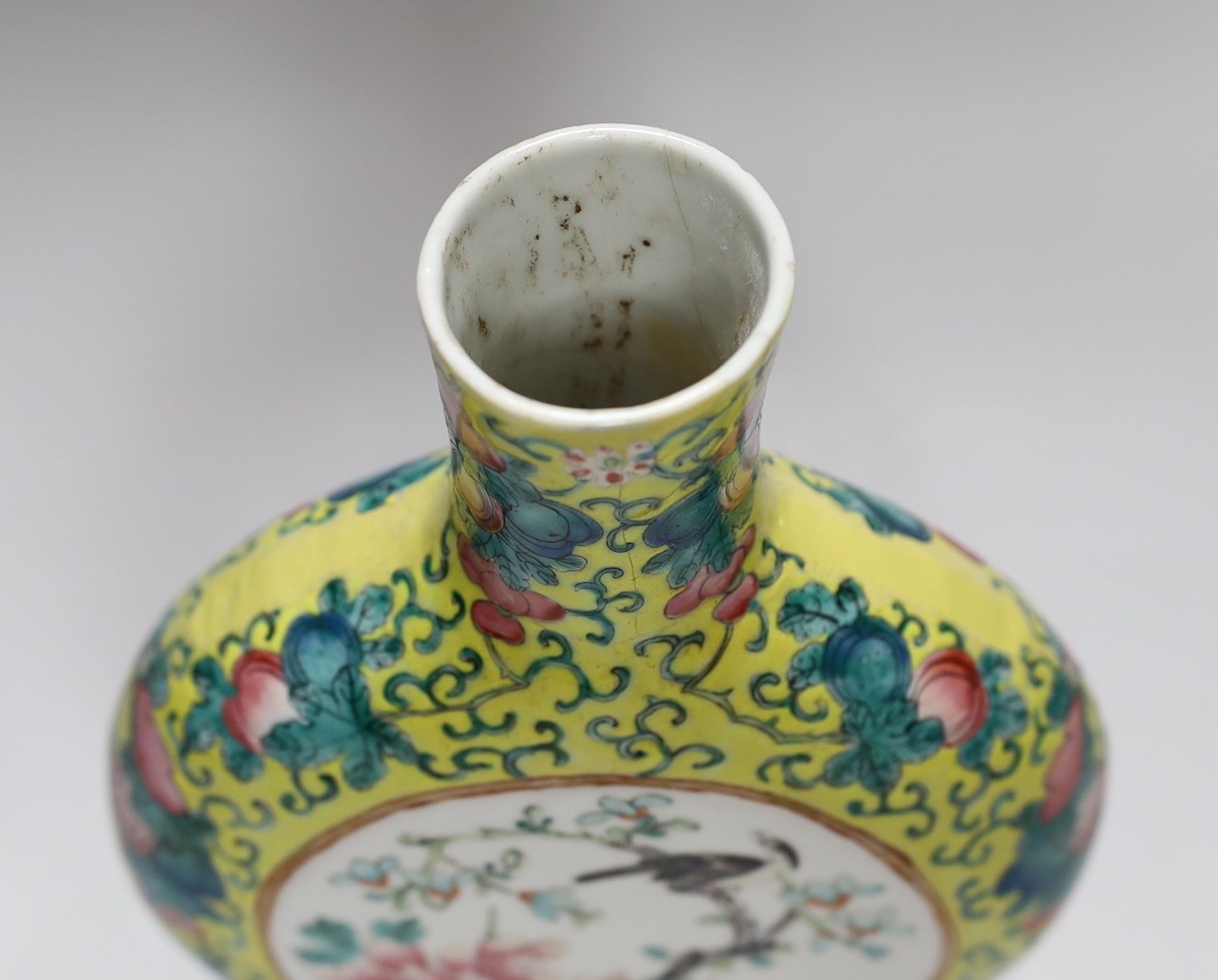 A Chinese yellow ground famille rose moonflask, late 19th century, neck a/f, 25cms high